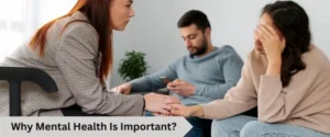 A woman comforting another woman while a man sits in the background, highlighting the importance of mental health.